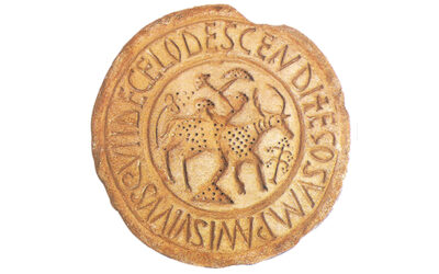 Una reproducción en el Museu Bíblic Tarraconense de un molde de pan eucarístico de los siglos V-VI